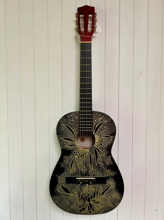 Gold Dust Woman – Upcycled Guitar with Black and Gold Protea Design on Galaxy Backdrop