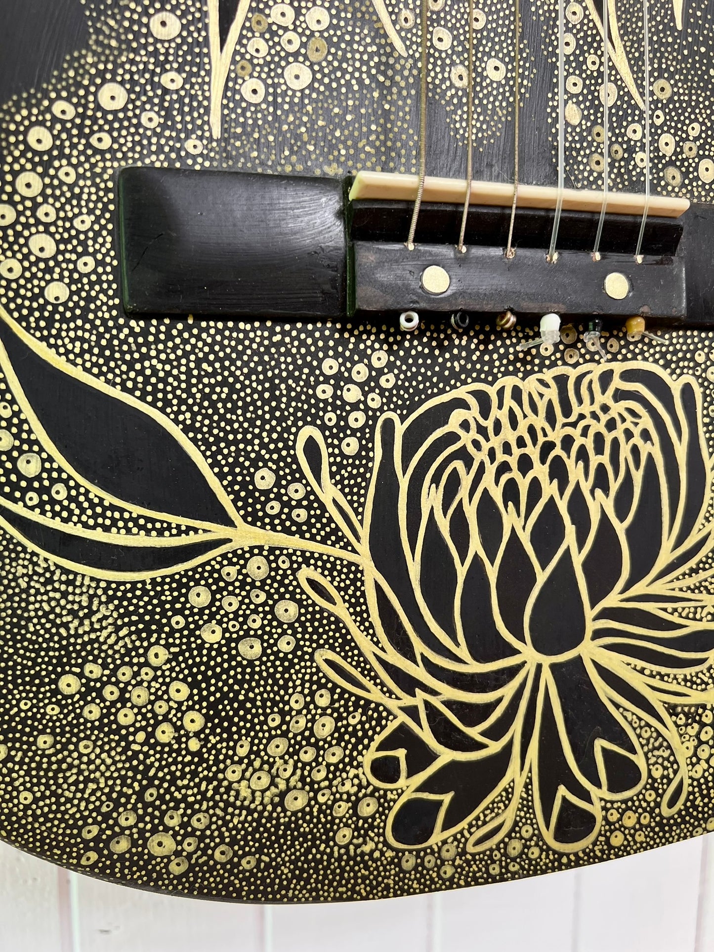 Gold Dust Woman – Upcycled Guitar with Black and Gold Protea Design on Galaxy Backdrop