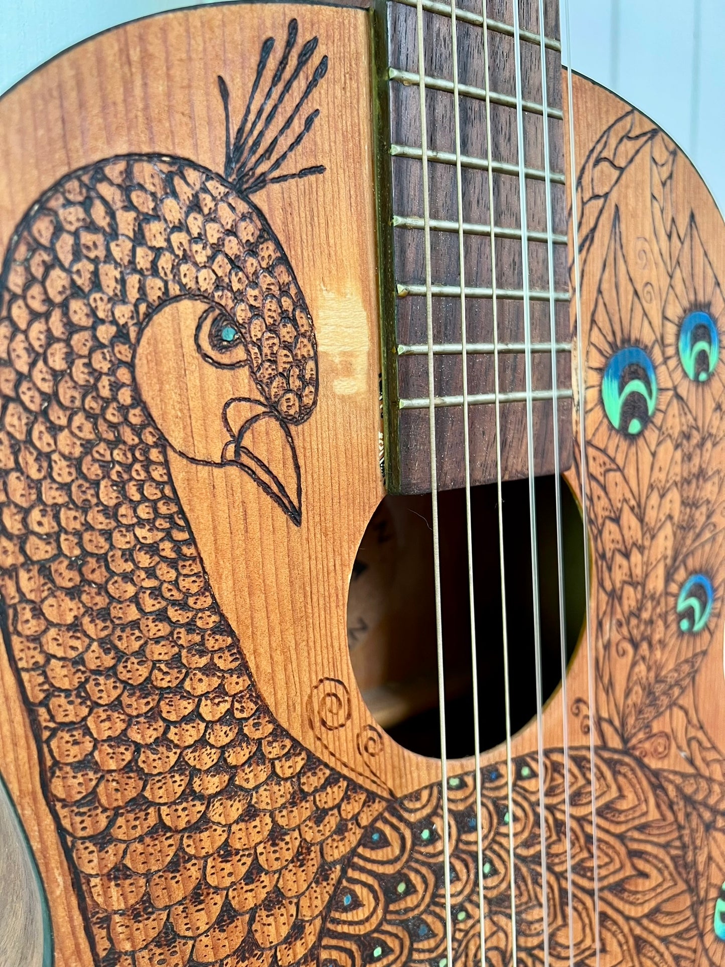 Songbird - Upcycled Guitar with Peacock Pyrography Design